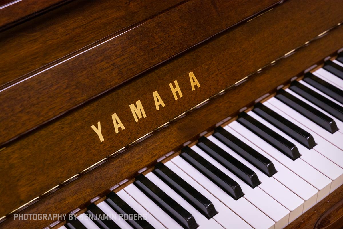 Yamaha-U1-Upright-Piano-in-Walnut-Logo-Keys.jpg